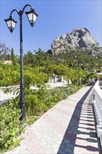 View of the Sokol (Kush-Kaya) mountain from the embankment of the resort village of Novy Svet.