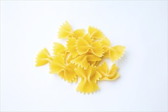 Bowtie pasta farfalle on the white background