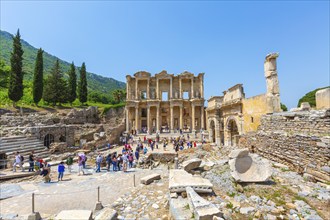 Kusadasi, Turkey, April 28, 2019: People visiting Celsus Library and old ruins of Ephesus or Efes