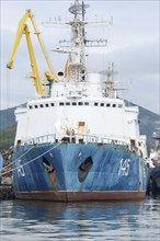 Russian warship Coast Guard of Border Guard Service of Russian FSB anchored at pier in seaport of