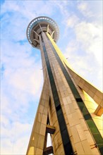 Macau Tower view against cloudy blue sky