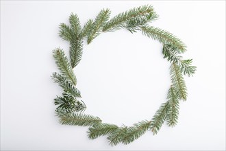 Christmas or New Year wreath composition. Decorations, fir and spruce branches, on white background