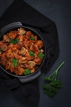 Bigos, bigus is a national Polish dish, made of cabbage and meat, stewed, homemade, no people