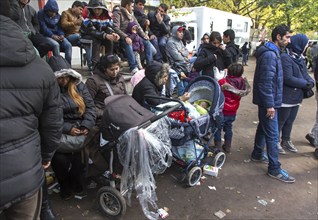 Refugees from Syria waiting to be registered at the Central Reception Centre for Asylum Seekers at