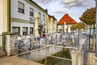 Bahnhofstrasse and Lauterbach in Bad Staffelstein, Bavaria, Germany, Europe