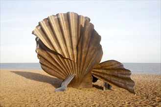 Scallop sculpture by artist Maggi Hambling, on shingle beach at Aldeburgh, Suffolk, England, United