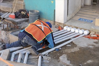 Oaxaca, Mexico, Workers rebuild Carlos Maria Bustamante Street in the center of Oaxaca City. Most