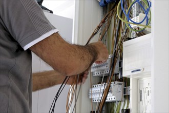 Professional electrical installation on a building shell