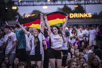 Scenes in the fan zone on Platz der Republik in front of the Reichstag building taken in Berlin, 29