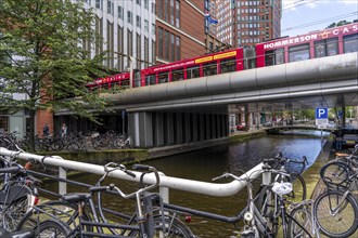 City centre, bridge for local transport over the Prinsessgracht, at The Hague Central Station,