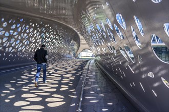 Light effects from the sun in the Parkbruk, a cycle and pedestrian bridge in the city centre of