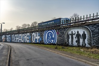 Large-format mural, graffiti, of the Schalke fan scene, below the A42 motorway,