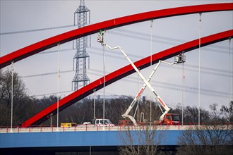 A42 motorway bridge, over the Rhine-Herne Canal, with massive structural damage, workers on lifting