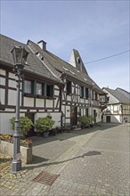 Half-timbered houses and street lamp, Herrstein, Hunsrück, Rhineland-Palatinate, Germany, Europe