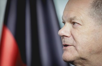 Olaf Scholz, Federal Chancellor, speaks at a press conference during the visit of Denis Becirovic,