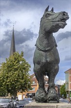 Prins, bronze statue of Brabant draft, draught horse by Belgian sculptor Koenraad Tinel at market