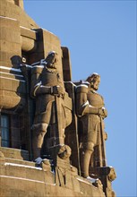 Guardian figures, Völkerschlachtdenkmal on a winter's day with snow, Leipzig, Saxony, Germany,