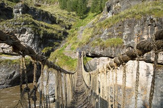 Inca rope bridge or suspension bridge Q'eswachaka over the en Río Apurímac, Canas province, Peru,