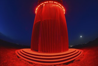 Red illuminated miner's light at night, Rheinpreußen spoil tip, Moers, Ruhr area, North