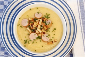 Swabian cuisine, potato soup with string sausages and pretzel croutons, hearty, savoury, typical