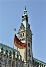 German flag at City Hall tower, Rathausmarkt square, Hamburg, Germany, Europe