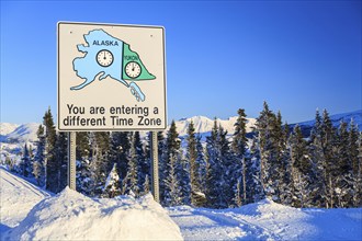 Sign, time zones, winter, snow, sunny, Haines Highway, Yukon, Canada, North America