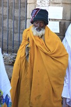 Tigray region, Axum city, Aksum, believers, pilgrims, mosque in front of the church, Ethiopia,