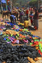 South Ethiopia, market in Jinka, market day, trade with plastic sandals, plastic shoes, market