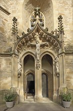 Entrance and portal with decorations and crucifix, door, open, castle church, Meisenheim,