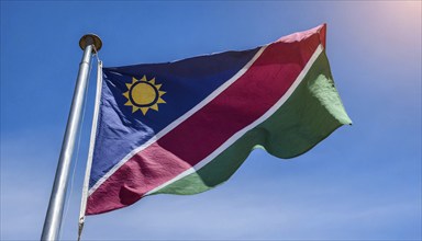 Flags, the national flag of Namibia flutters in the wind