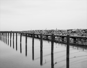 Long exposure, groynes and wooden stakes in the Baltic Sea, Rügen, Mecklenburg-Western Pomerania,