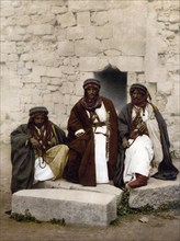 Bedouins in front of a house, Lebanon, Historical, digitally restored reproduction from a 19th