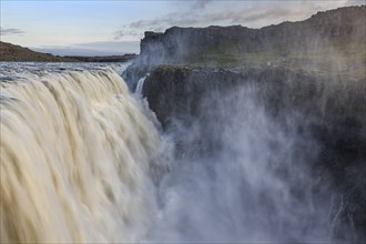 Large waterfall in a gorge, spray, rapids, summer, midnight sun, Dettifoss, North Iceland, Iceland,