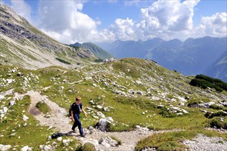 Ten-year-old boy hiking, Nebelhorn, Allgäu Alps, Bavaria, Germany, Europe