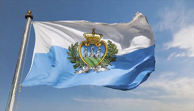 Flags, the national flag of San Marino flutters in the wind