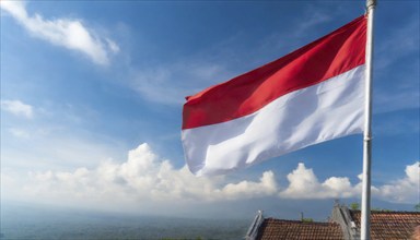 The flag of Indonesia flutters in the wind