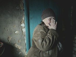 Grandmother Larisa had to flee her home village near Kupiansk. She cares for her traumatised