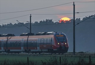 Deutsche Bahn regional express RE3 at sunset, Danewitz, 08/12/2020