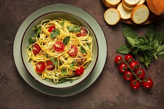 Yellow zucchini salad, with cherry, vegetarian food, sliced into strips, homemade