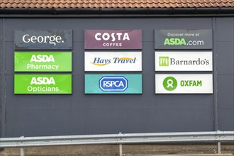 Signs for shops at the Meadow Centre, Stowmarket, Suffolk, England, UK