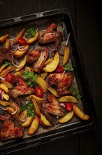 Fried chicken wings, with potatoes, and spices, homemade, fast food, no people