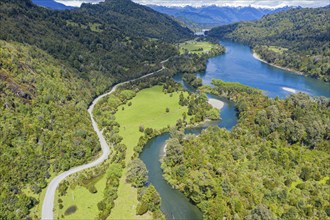 Road X-12 from La Junta to Puerto Raul Marin Balmaceda, road winding along river Rio Palena, aerial