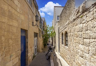 Israel, Jerusalem old narrow streets of Nahlaot historic neighborhood with many small synagogues,