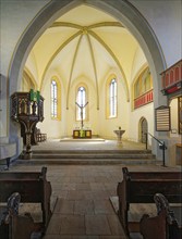 Pulpit, altar, crucifix and baptismal font, late Gothic Protestant-Lutheran town church of St