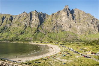 Aerial view of campsite at beach Ersfjordstranden, fjord Ersfjord, golden restroom, Senja island,