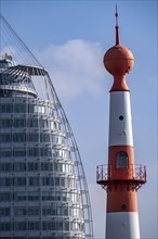 Skyline of Bremerhaven, Atlantic Sail City Hotel skyscraper, front light Bremerhaven, a red and