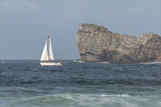 Sailboat sailing offshore on the Atlantic Ocean. Camaret sur mer, Crozon, Finistere, Brittany,