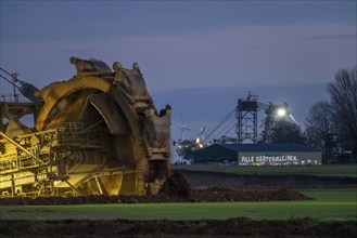 Two excavators are working around the hamlet of Lützerath, occupied by climate activists, the