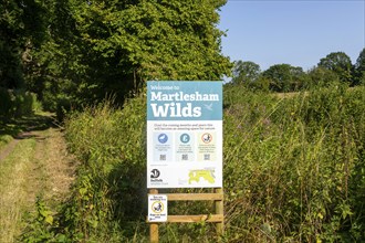 Sign for Martlesham Wilds, Suffolk Wildlife Trust farmland rewilding project, near Woodbridge,