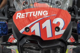 Rescue service, motorbike vehicle, inscription emergency number 112